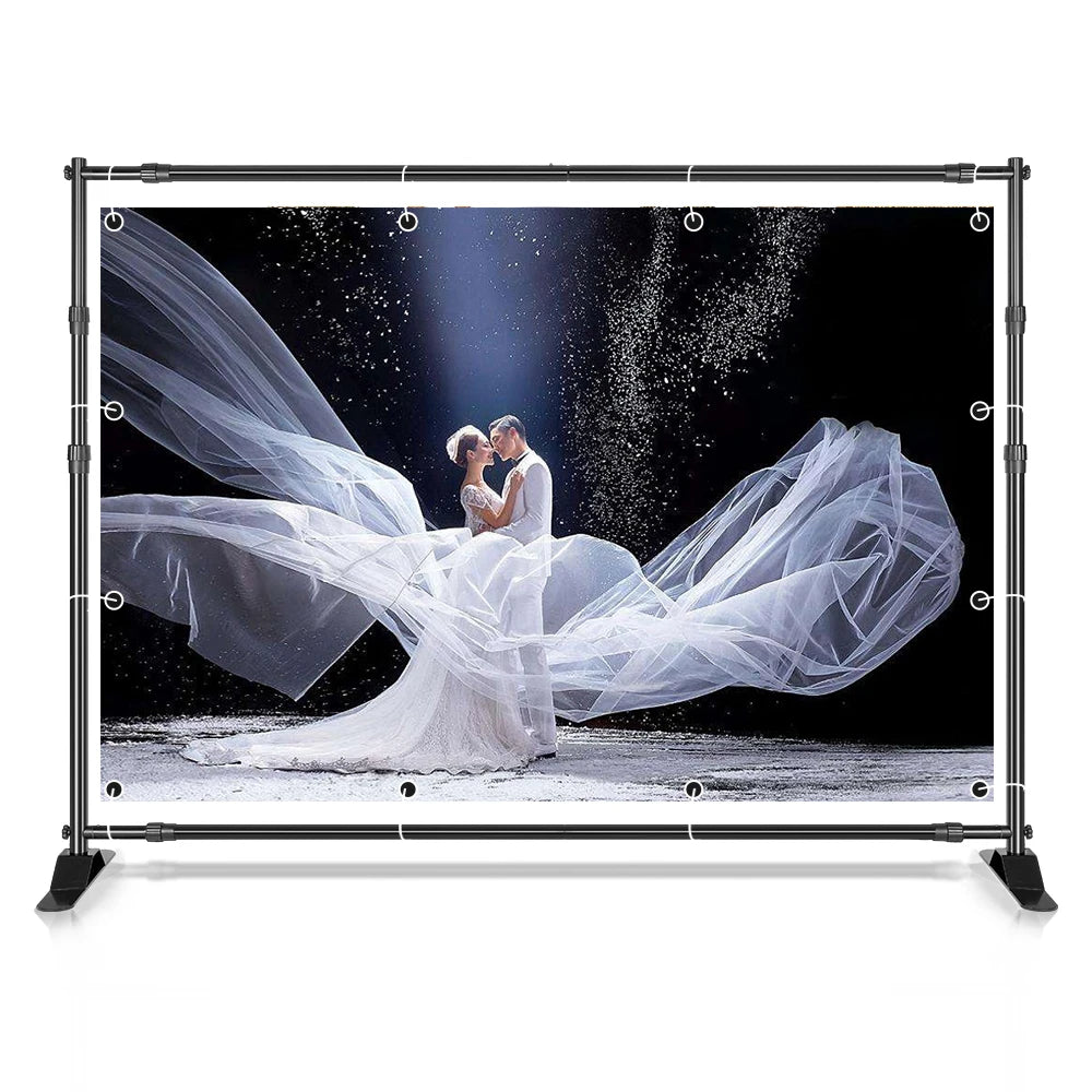 Bride in a flowing veil photographed against a white backdrop mounted on the adjustable aluminum crossbar backdrop stand