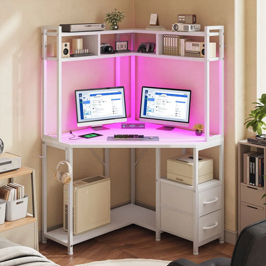 Corner white computer desk with pink LED lighting, storage drawers, shelves and headphone hook